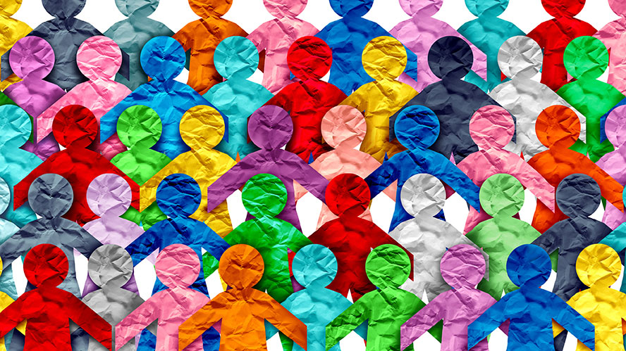 Overlapping rows of human figure cutouts made from crumpled paper in various colors, including red, blue, green, yellow, pink, and white, arranged on a plain white background.